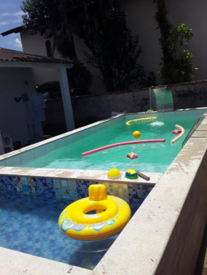 CASA DE PRAIA COM DUAS PISCINAS E GARAGEM